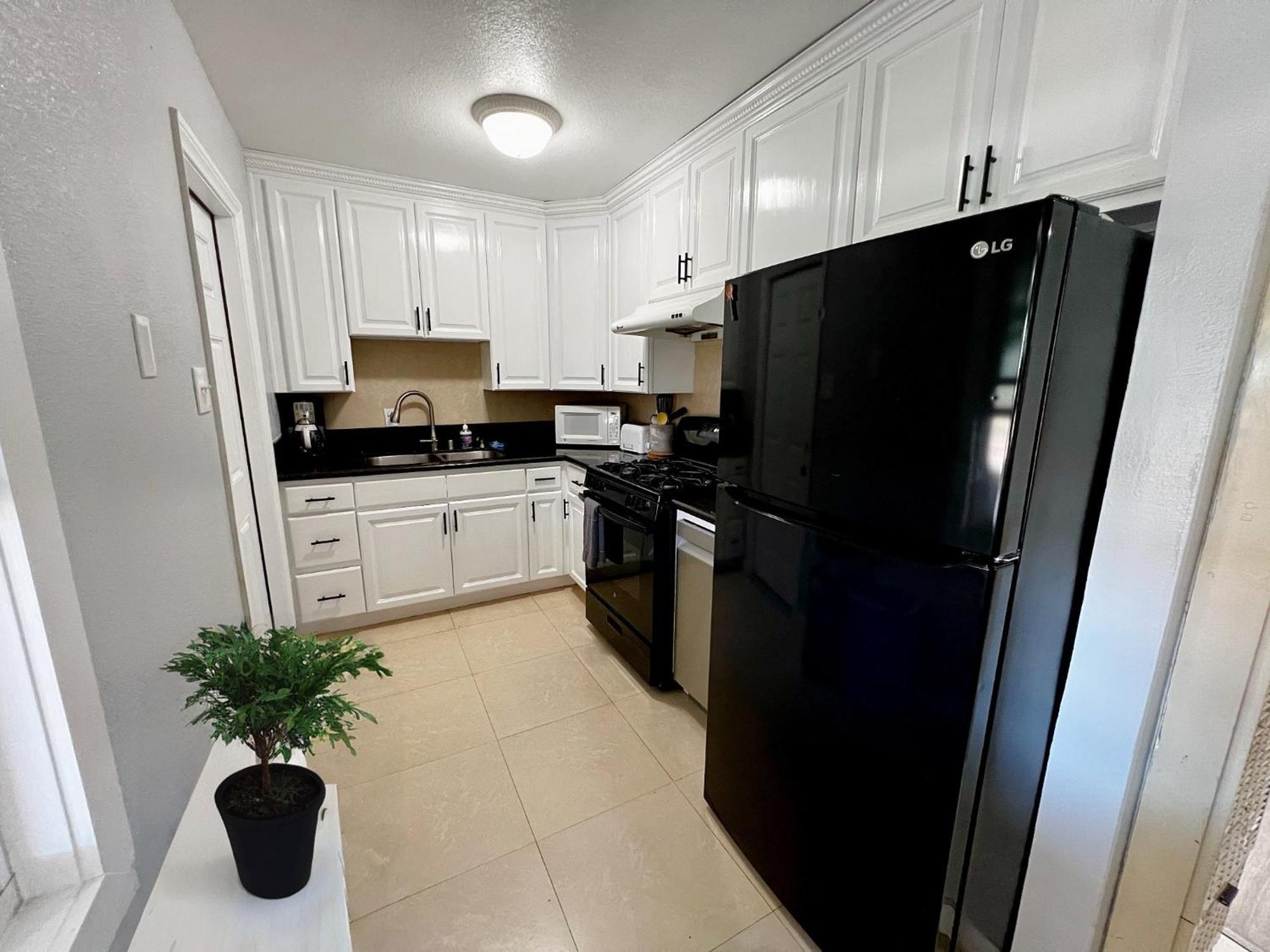 Seaworld Retreat: 4br House/jacuzzi/bbq Holiday home